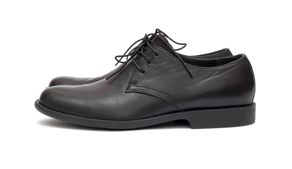 Zapatos negros para hombre sobre fondo blanco — Foto de Stock