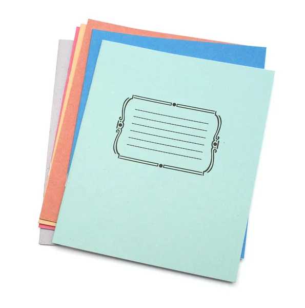 Multicolored exercise books over the white background — Stock Photo, Image