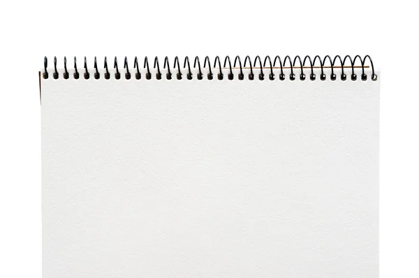 Närbild på en tom vit anteckningsbok på vit bakgrund — Stockfoto
