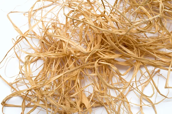 Straw for packing and decorating on white background — Stock Photo, Image