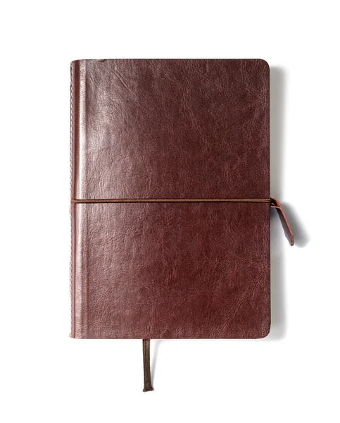 Beyaz zemin üzerinde kahverengi deri notebook — Stok fotoğraf