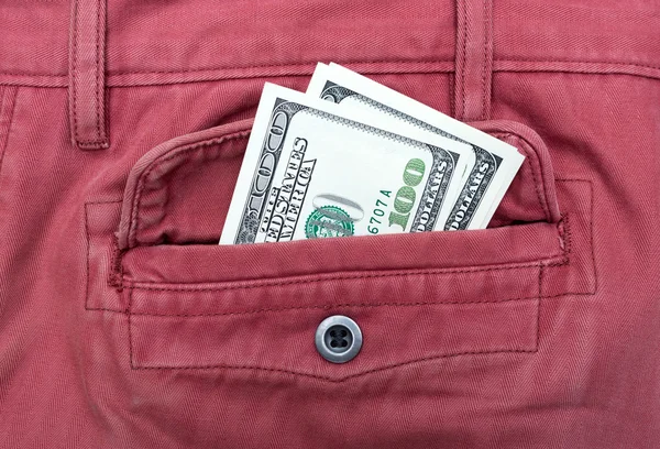 Dólares americanos no bolso das calças de ganga — Fotografia de Stock