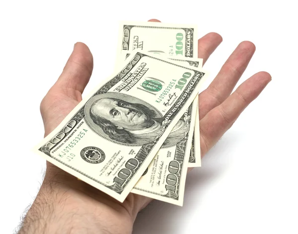 Isolated hand with pack of one hundred dollars — Stock Photo, Image