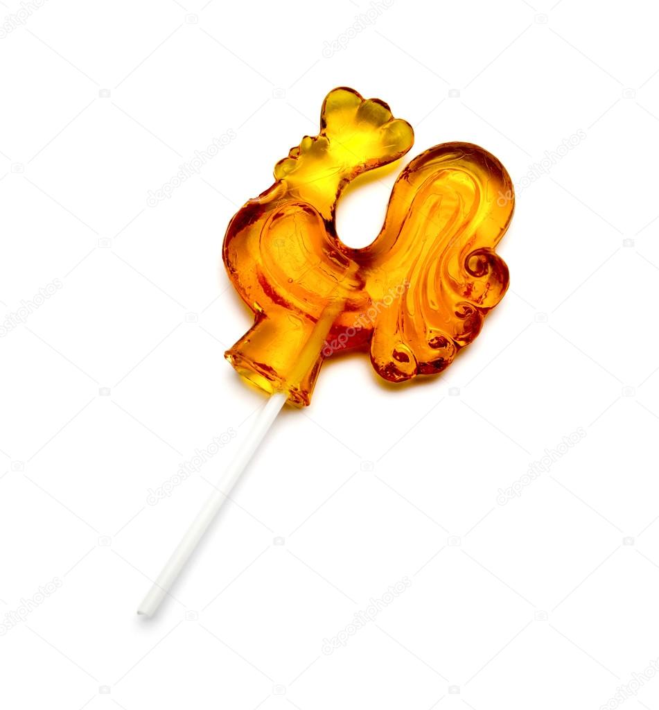 Sugar Lollipop in the Shape of Rooster Isolated on White Backgro