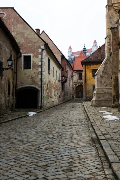 Street of Bratislava old town. Bratislava castle on top — Stock Photo, Image