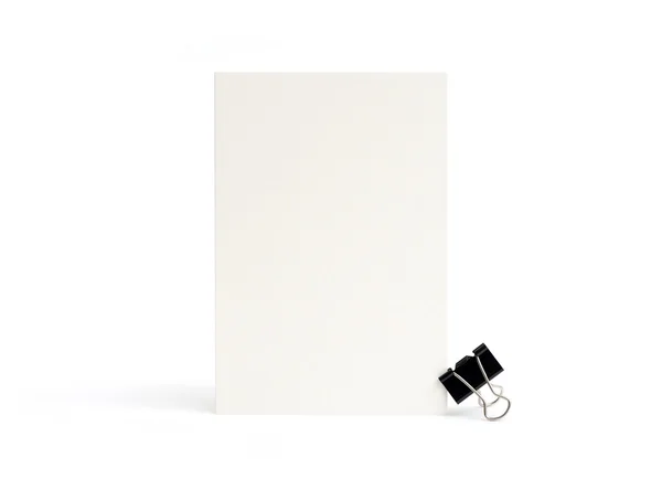 Cartão branco em branco em um branco — Fotografia de Stock