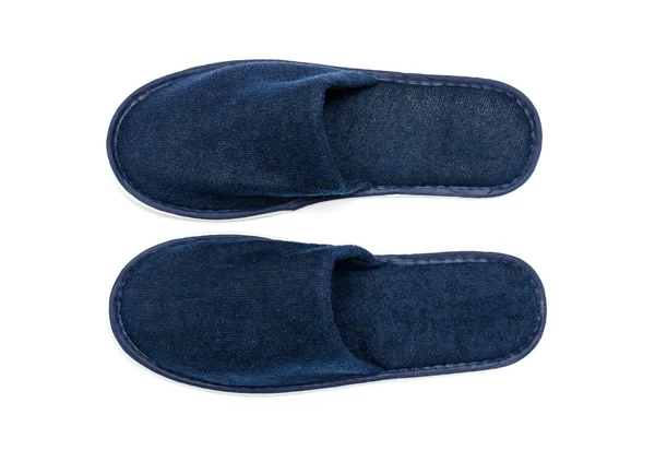 Une paire de chaussons bleus sur fond blanc — Photo