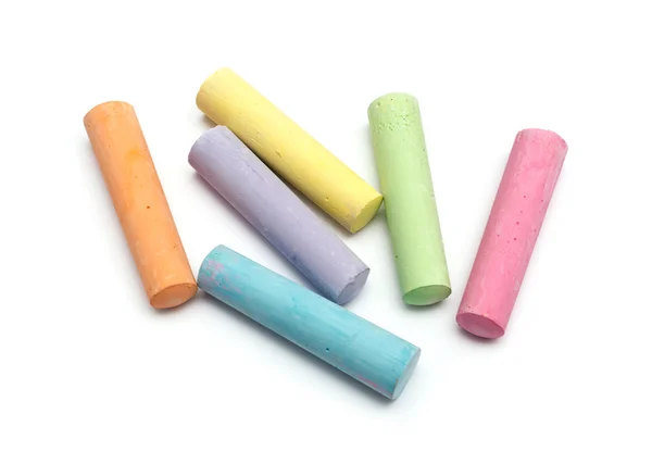 Chalks in a variety of colors arranged on a white background — Stock Photo, Image