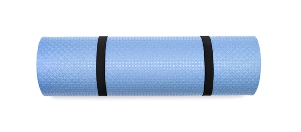 为了锻炼身体，孤立的白色背景上的蓝色瑜伽垫. — 图库照片