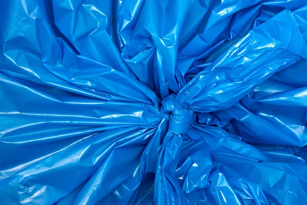 Une texture de sac en plastique bleu, macro, fond — Photo