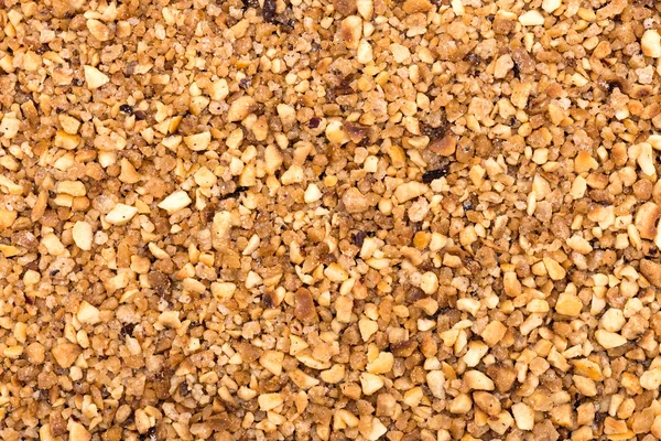 Morceaux de noix hachée comme texture de fond abstraite — Photo
