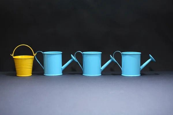 Watering Cans And Bucket — Stock Photo, Image