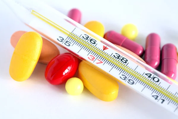 Pills And Thermometer — Stock Photo, Image