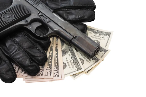 Pistola en guantes y dinero — Foto de Stock