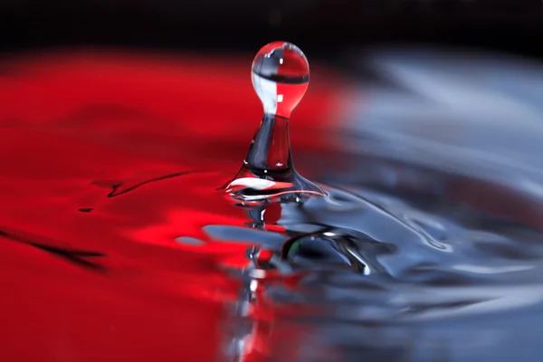 Rode en zwarte Splash — Stockfoto