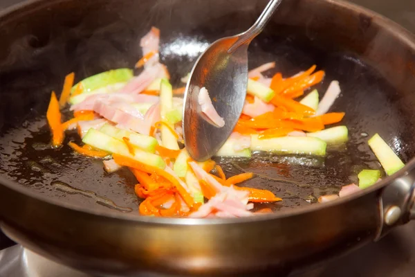 Pasta with sauce frying on pan — Stock Photo, Image