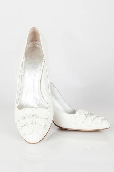 Взуття на білому — стокове фото