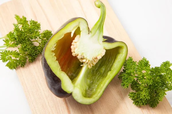 Pepper on cutting board — Stock Photo, Image