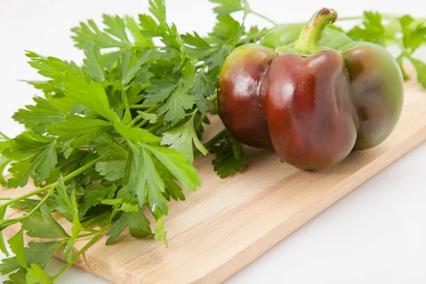 Pepper on cutting board — Stock Photo, Image