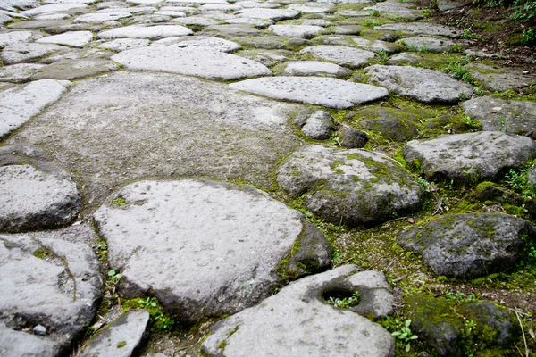 Ancient cobblestone road — Stock Photo, Image