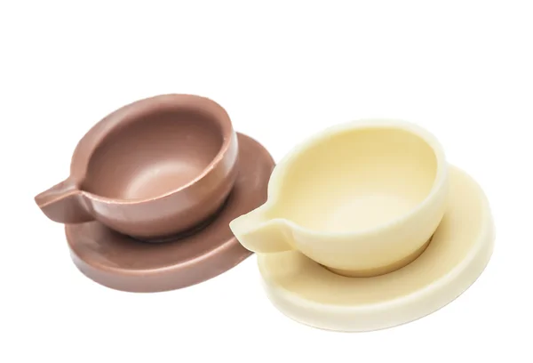Coppia di tazzine da caffè, tazza e piattino in cioccolato bianco e latte — Foto Stock