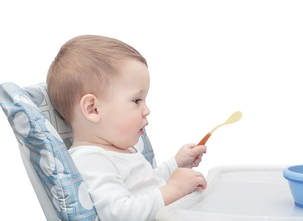 O miúdo de um ano vai comer. — Fotografia de Stock