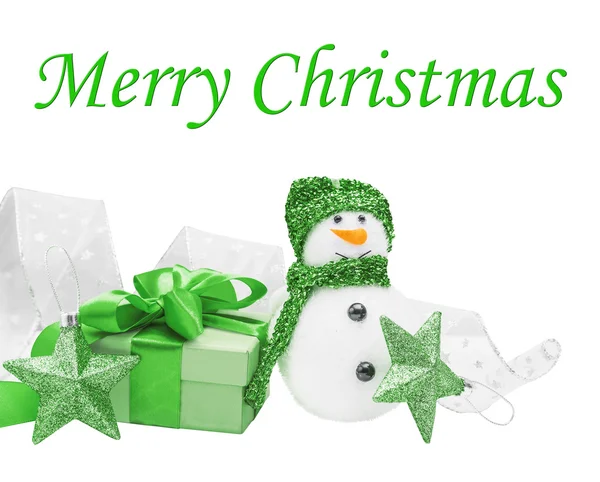 Снеговики, зеленый подарок, лук, звезды — стоковое фото