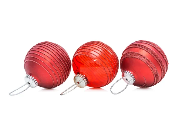 Set van drie rode kerstballen — Stockfoto