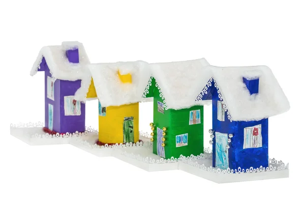The set of paper multi-colored Christmas houses covered snow — Stock Photo, Image