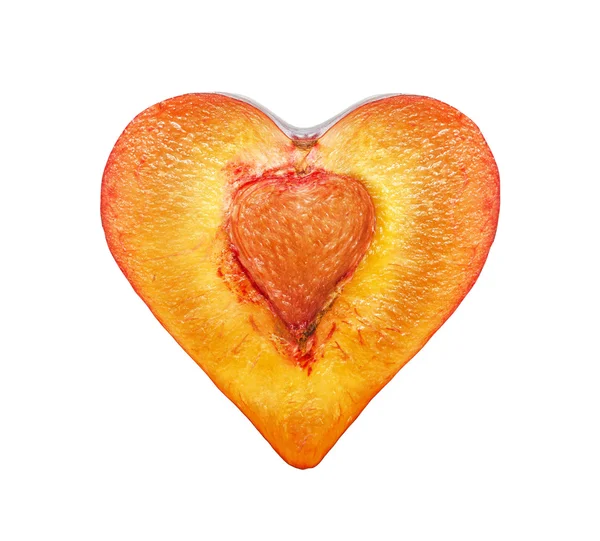 De helft van de pruimen in de vorm van hart — Stockfoto