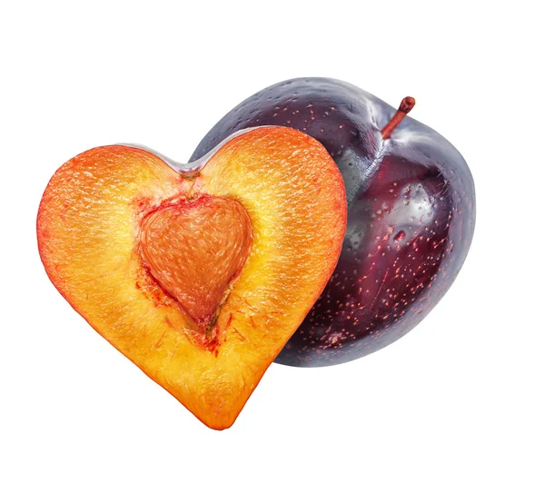 The half of the plums in the form of heart — Stock Photo, Image