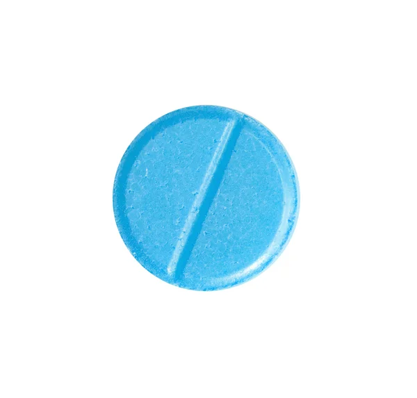 Macro comprimé de pilule médicale bleu isolé sur blanc — Photo