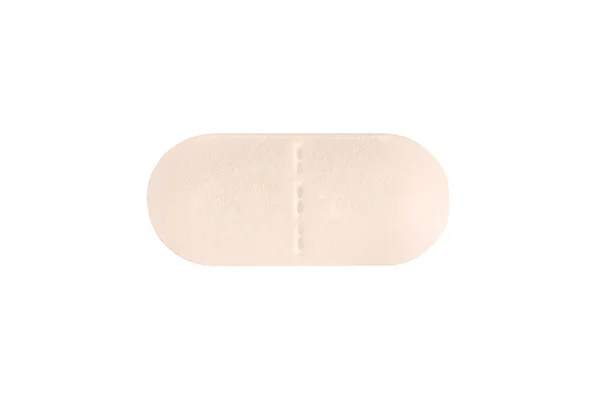 Макро помаранчева медична таблетка ізольована на білому — стокове фото