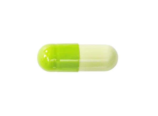 Comprimido de pílula médica macro-verde isolado em branco — Fotografia de Stock