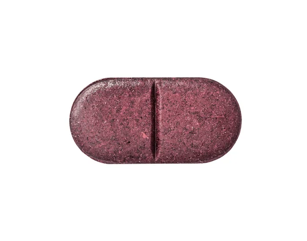 Makro röda medicinska piller tablet isolerad på vit — Stockfoto