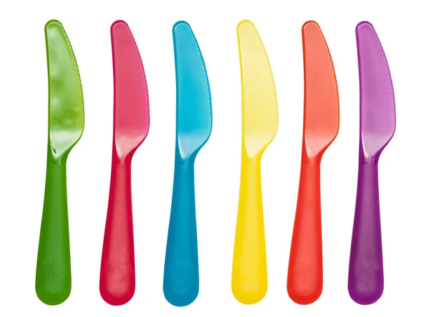 Plastic knives violet, orange, yellow, blue, red isolated on the white — Stock Photo, Image