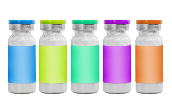 Набор лилового, синего, зеленого и оранжевого макро-лекарственных флаконов, выделенных на белом
