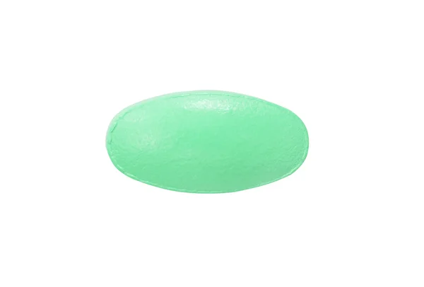 Tableta de píldora médica verde macro aislada en blanco — Foto de Stock