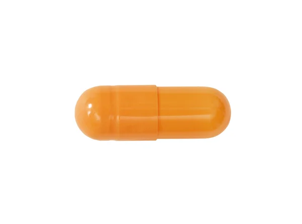 Macro orange medical pill — Stock Photo, Image