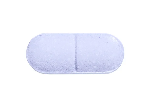 Макро-синяя таблетка — стоковое фото