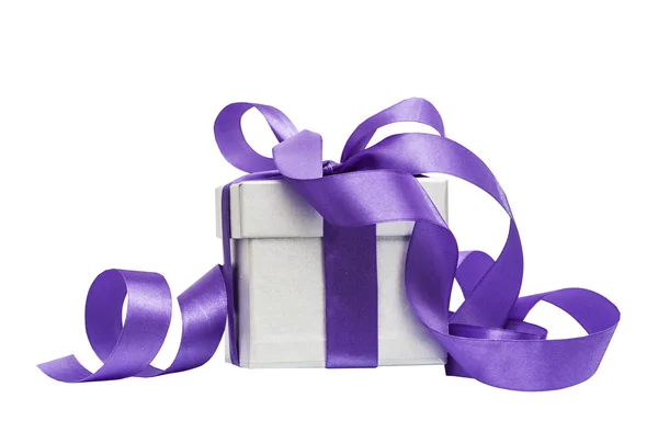 Gift box with a lilac bow Royalty Free Stock Images