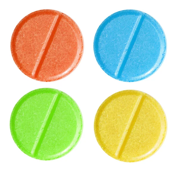 红色、 蓝色、 绿色和黄色的药丸一套 — 图库照片