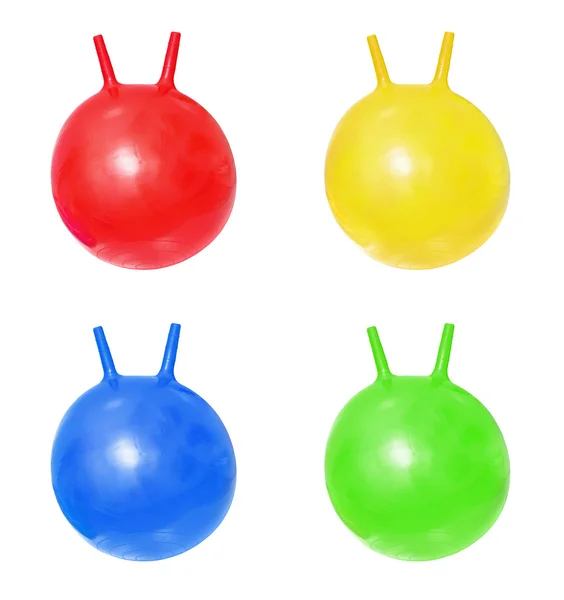 Bright red, blue, green, yellow fitballs — Stock Photo, Image
