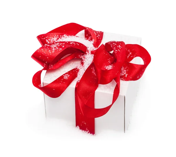 Confezione regalo con fiocco rosso — Foto Stock