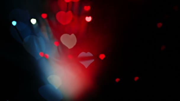 Abstraktní Valentýn srdce formoval bokeh pozadí v červené a modré barvy — Stock video