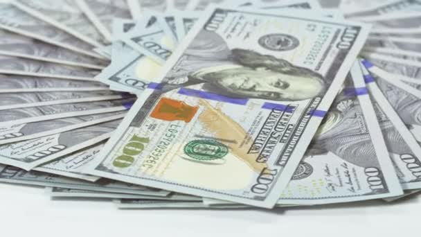 Muitas notas bancárias de 100 dólares americanos girando fundo de negócios — Vídeo de Stock