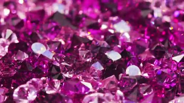 Много фиолетовых камней драгоценных камней бриллиантов вращающихся роскошный фон — стоковое видео