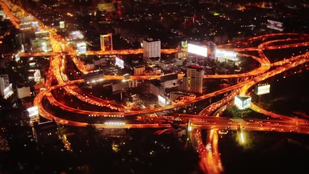 Modern crossroads and buildings at night in Bangkok — Stock Video