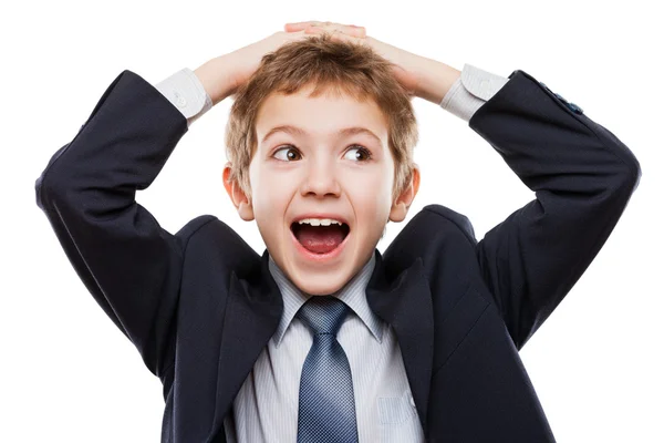 Stupito o sorpreso bambino ragazzo in abito da lavoro tenendo peli su — Foto Stock