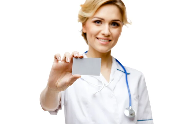 Woman doctor standing on white background — Stock Photo, Image